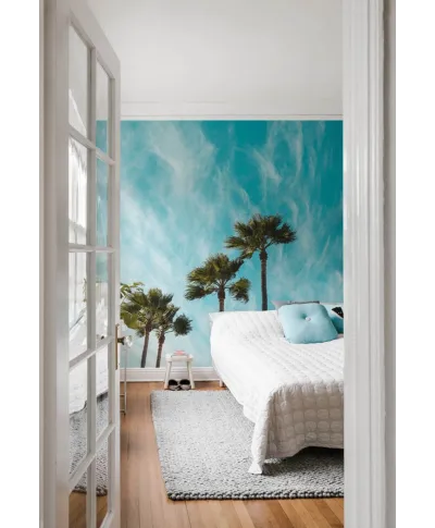 Palmy na tle nieba - fototapeta