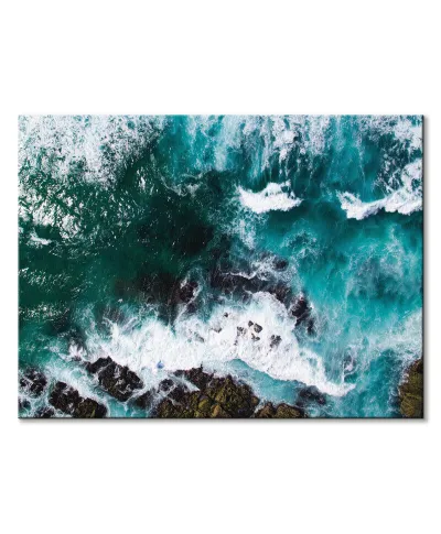 Fale uderzające o skały - obraz na płótnie